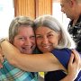 Ann Menninger Johnson and Claudia Robards Perney (Claudia's husband Bruce in background)